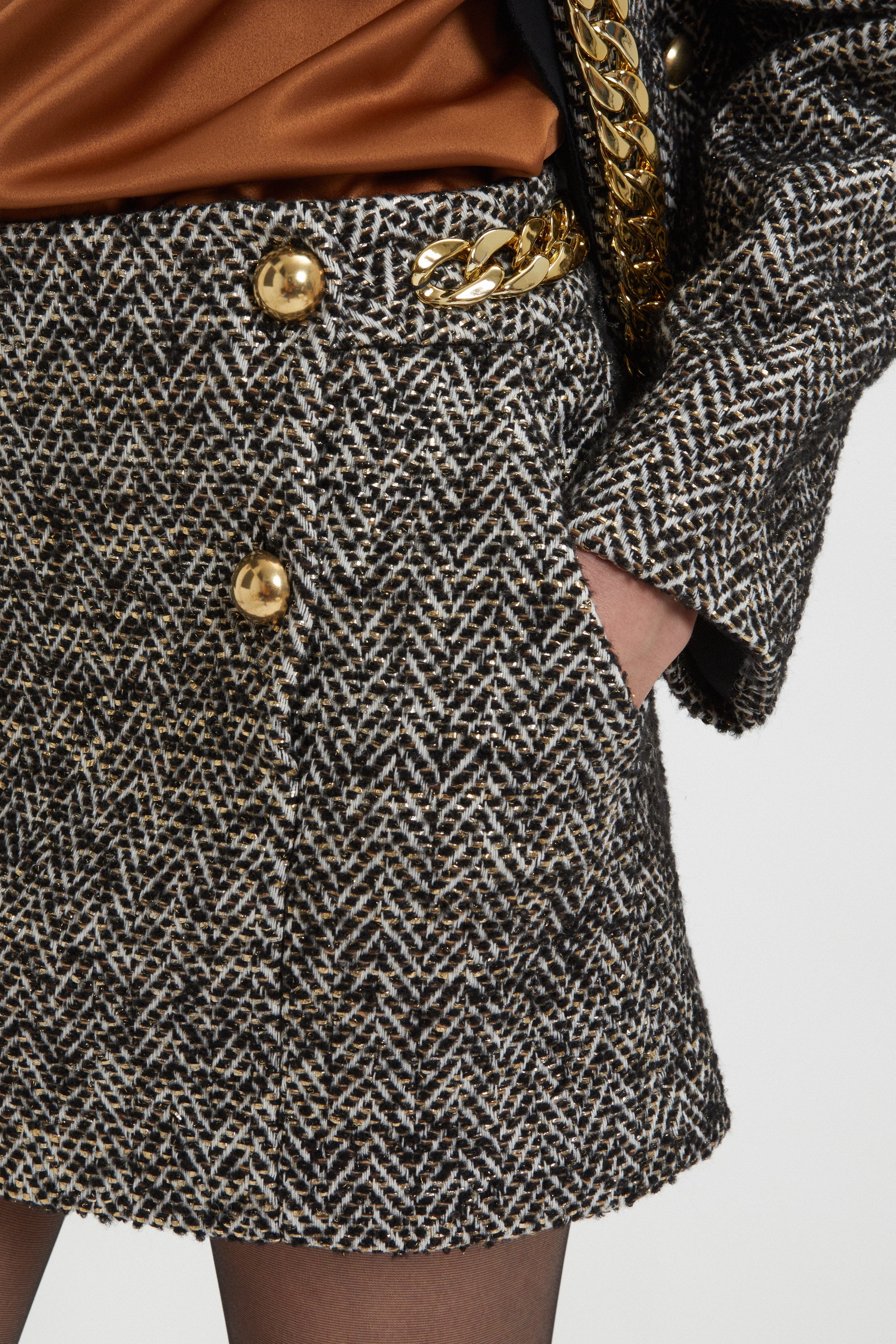 Image of GONNA IN TWEED CON CATENA ORO