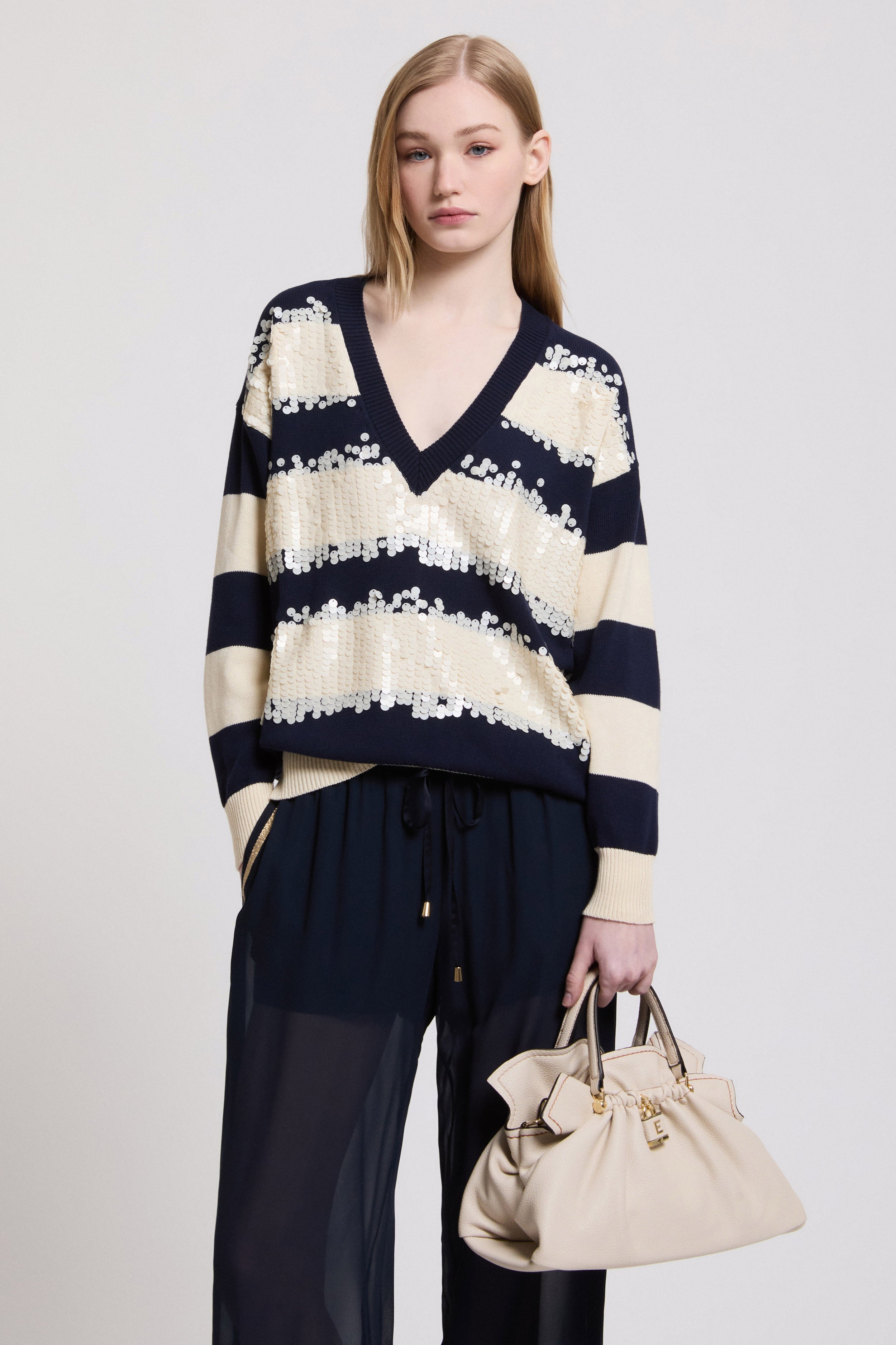 Image of V-NECK SWEATER WITH SEQUINS AND STRIPES