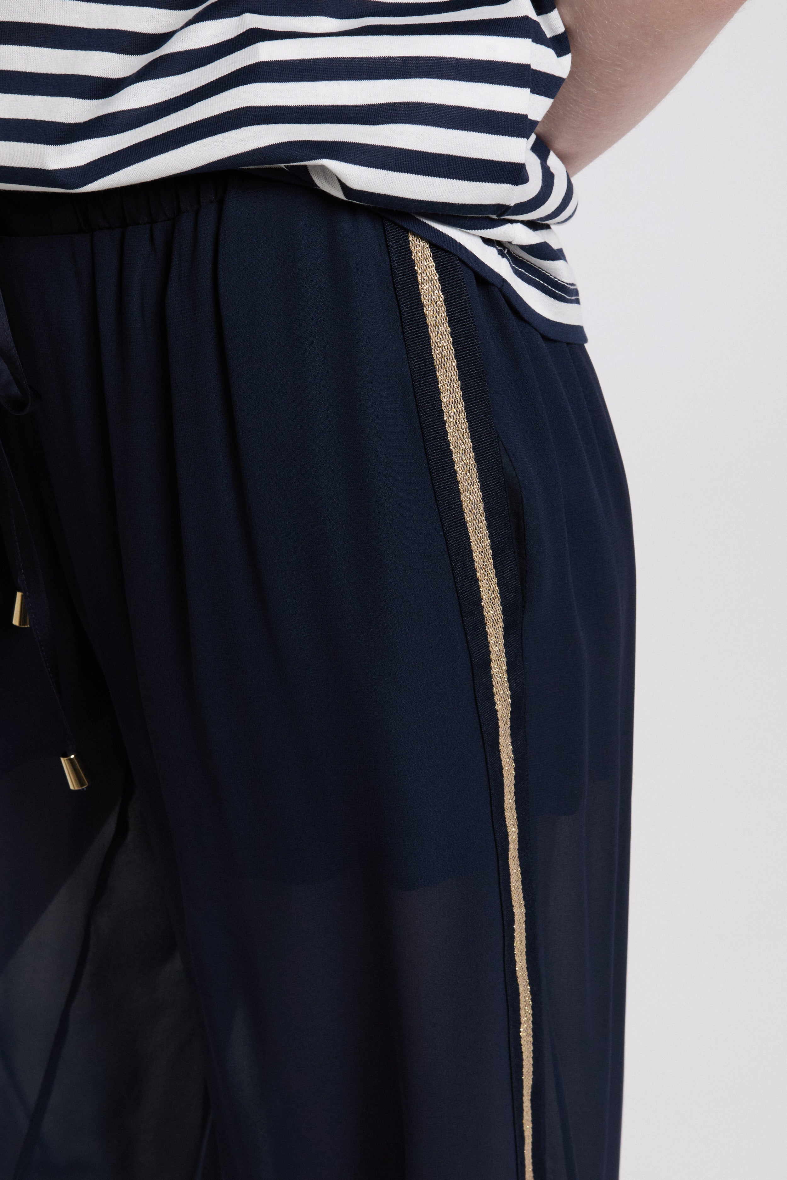 Image of GEORGETTE PANTS WITH GOLD SIDE BAND