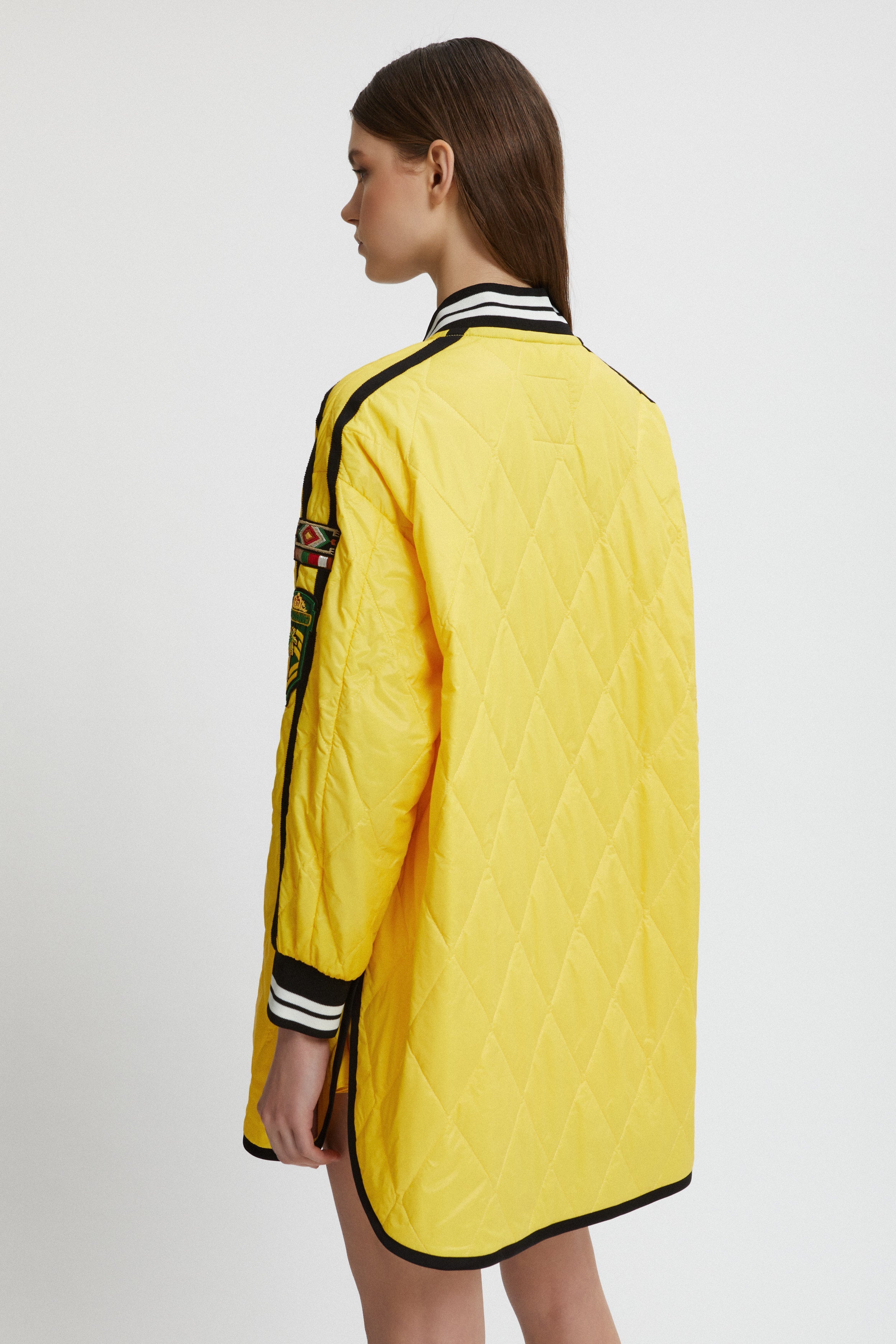 BOMBER TRAPUNTATO CON BORDI IN MAGLIA