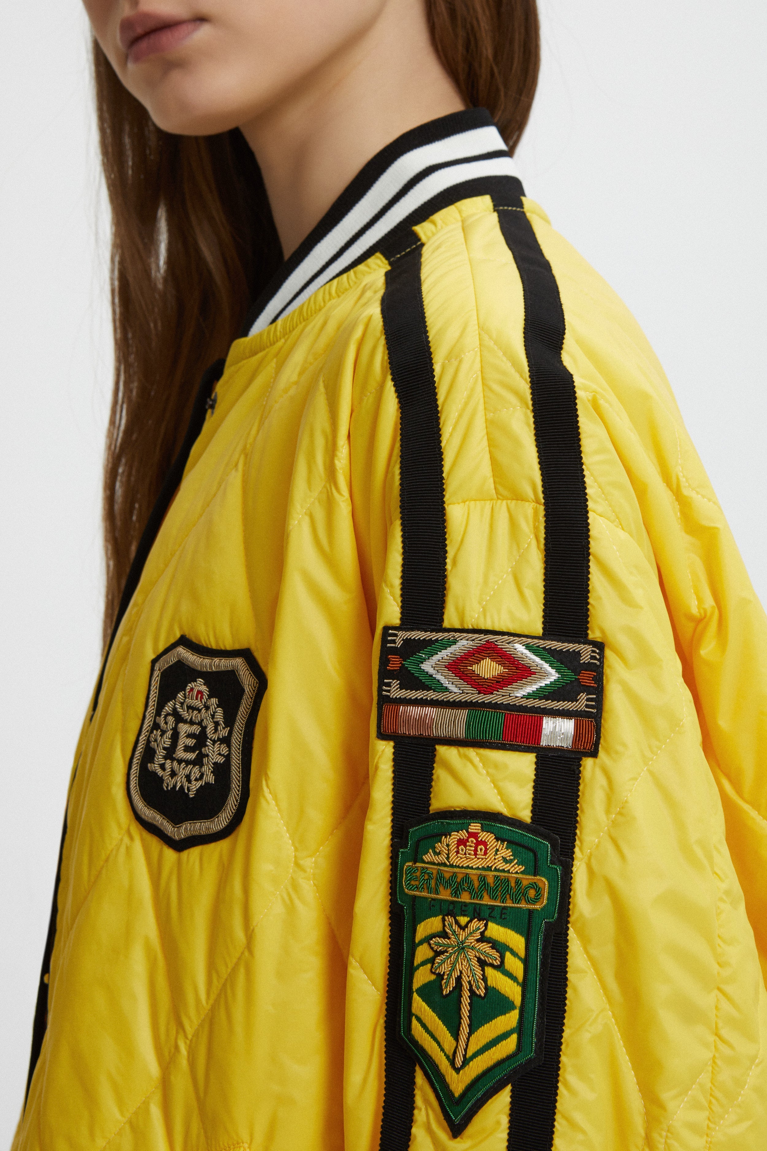 BOMBER TRAPUNTATO CON BORDI IN MAGLIA