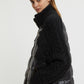 DOWN JACKET WITH KNITTED SLEEVES