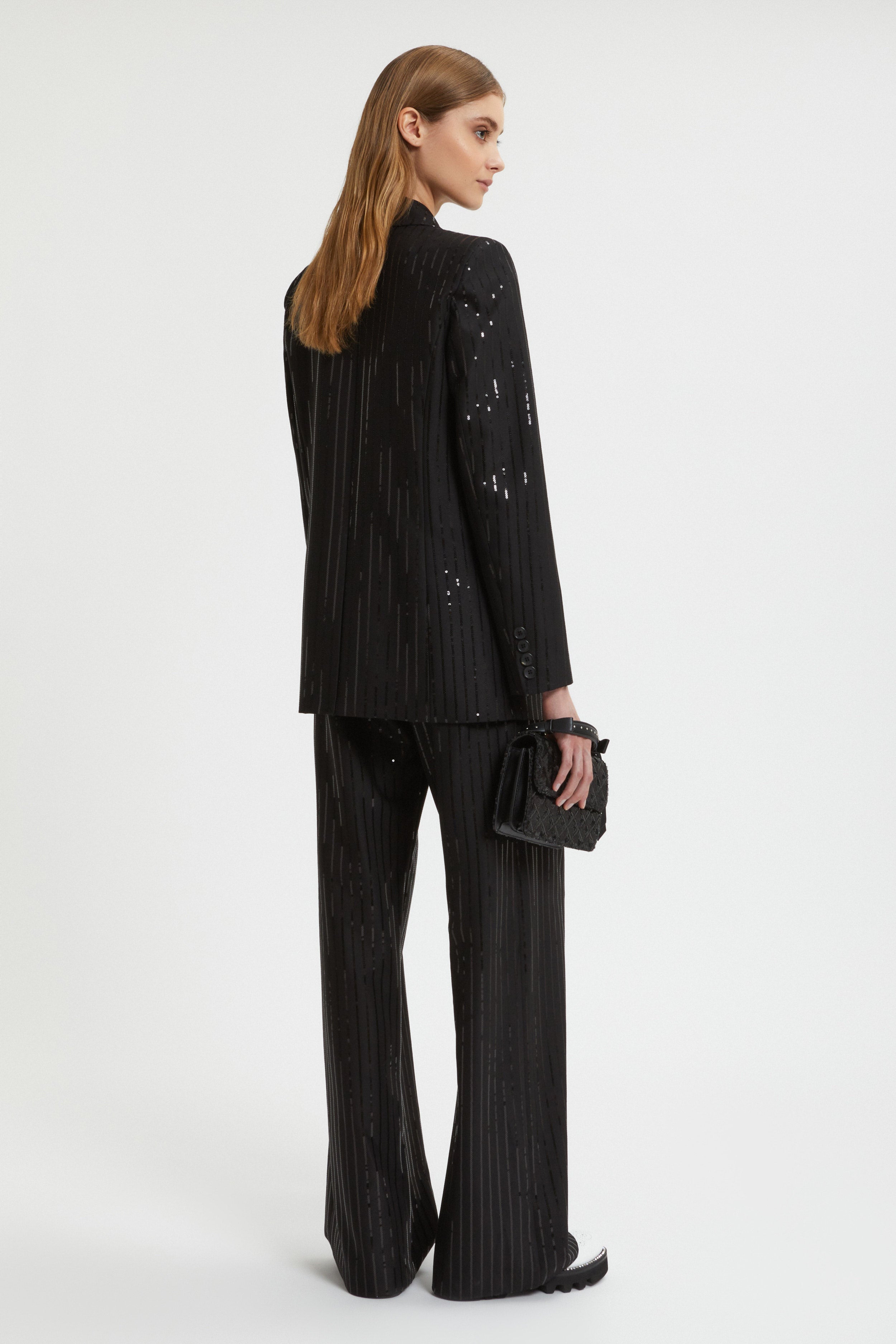 PANTALONI GESSATI CON PAILLETTES