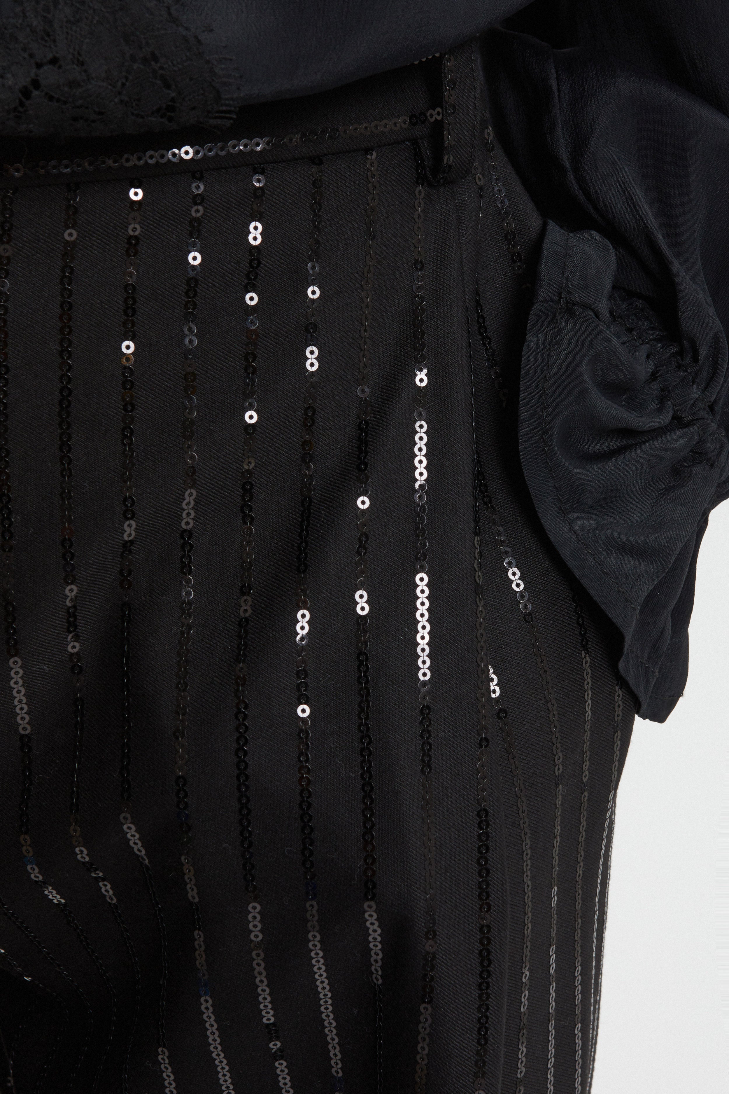PANTALONI GESSATI CON PAILLETTES