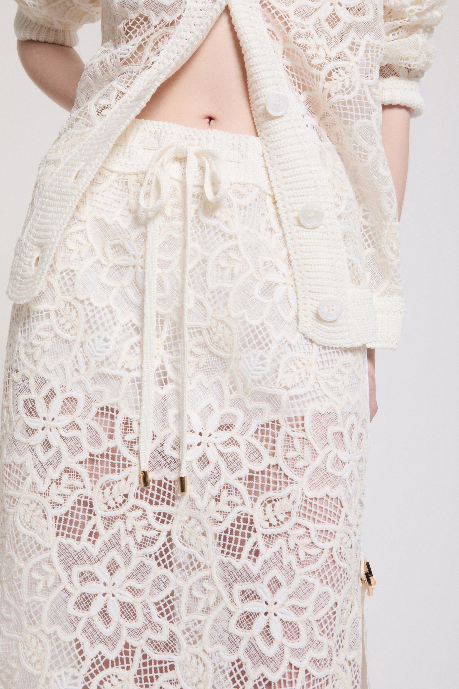 GONNA LONGUETTE DI PIZZO REBRODÈ CON BORDI IN MAGLIA