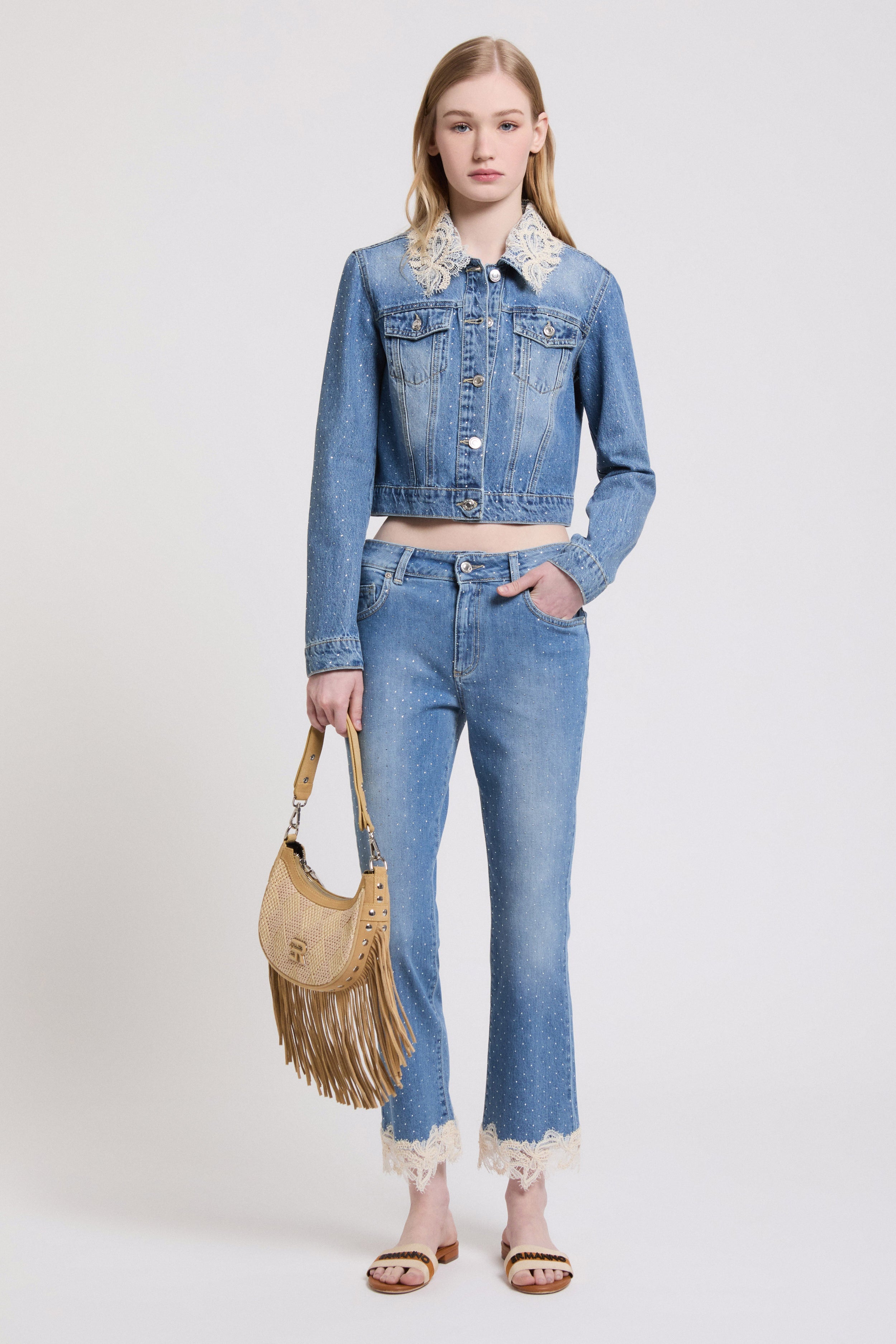 Image of JEANS CROP CON STRASS E BORDO DI PIZZO