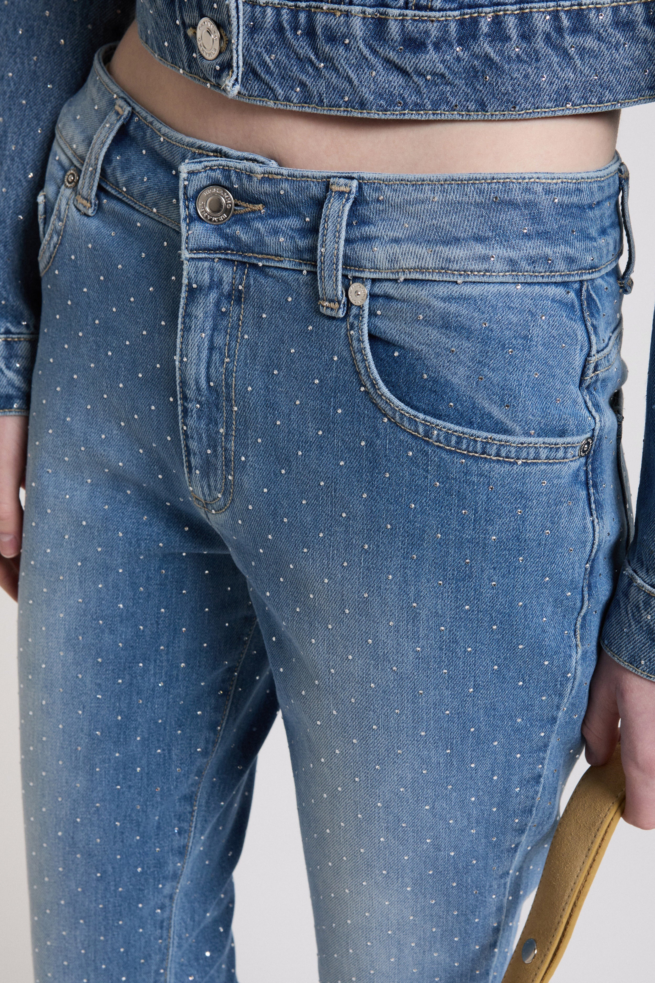 Image of JEANS CROP CON STRASS E BORDO DI PIZZO