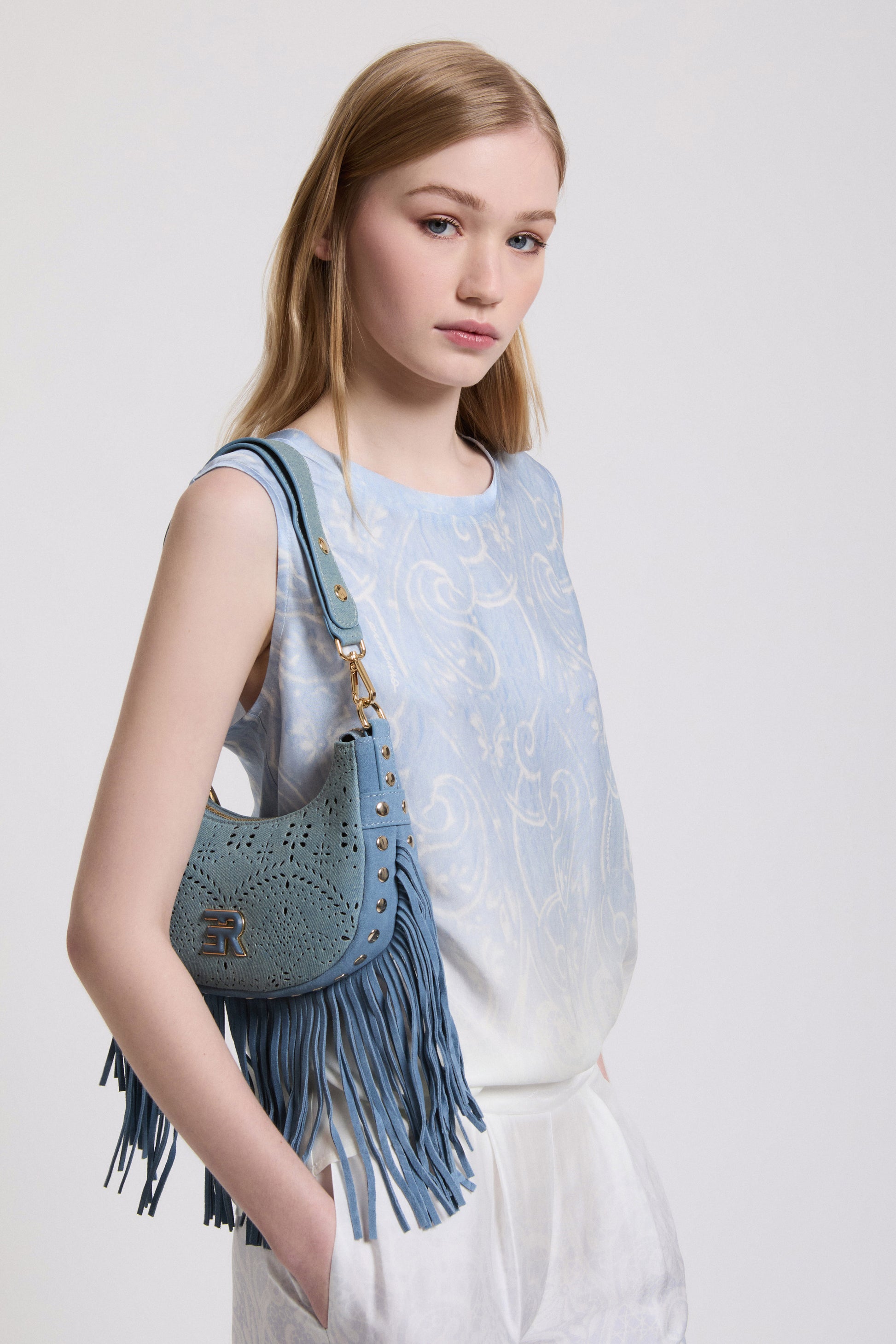 OPENWORKED HOBO BAG WITH FRINGES AND STUDS