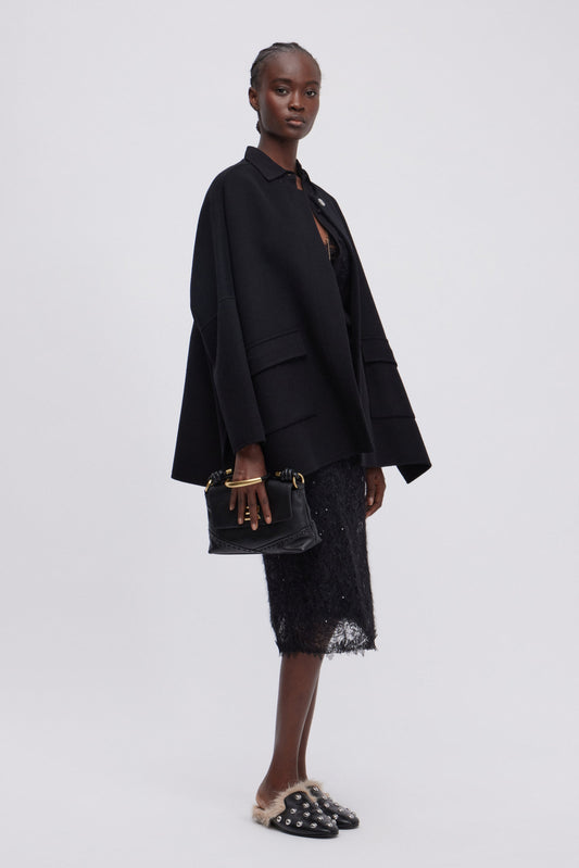 CAPE AVEC FENTES LATĖRALES