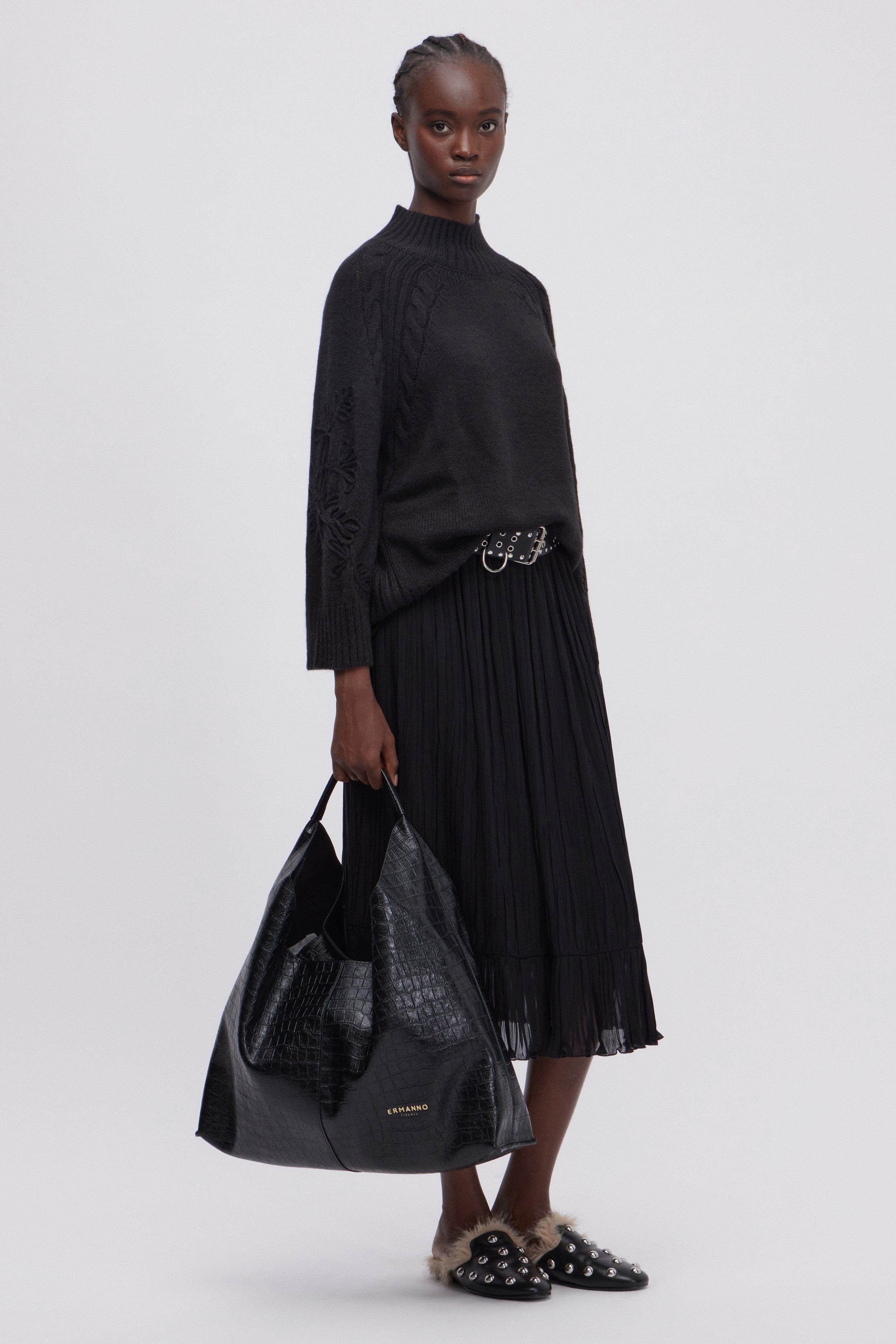 SWEATER WITH EMBROIDERY ON THE SLEEVES