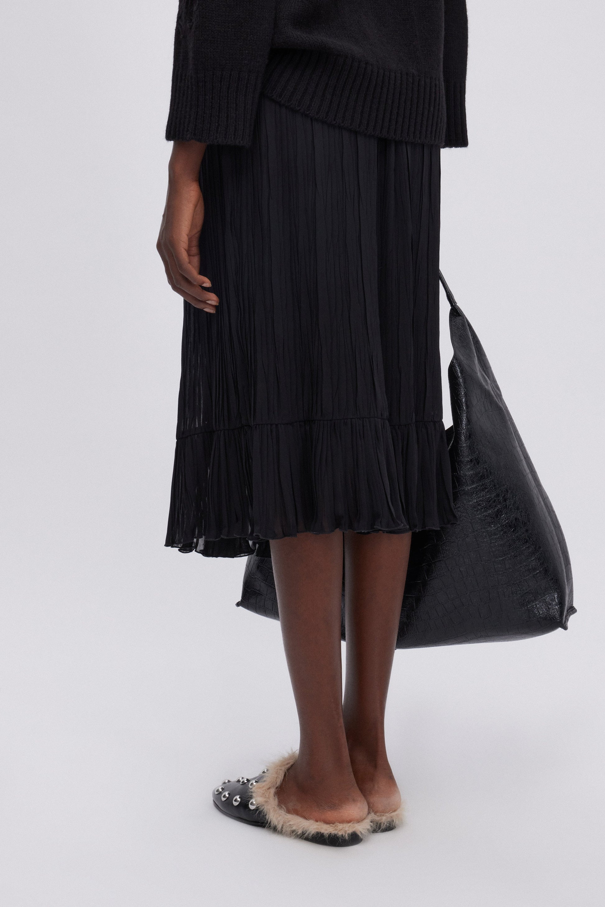 GONNA LONGUETTE DI GEORGETTE PLISSE' CON BALZA