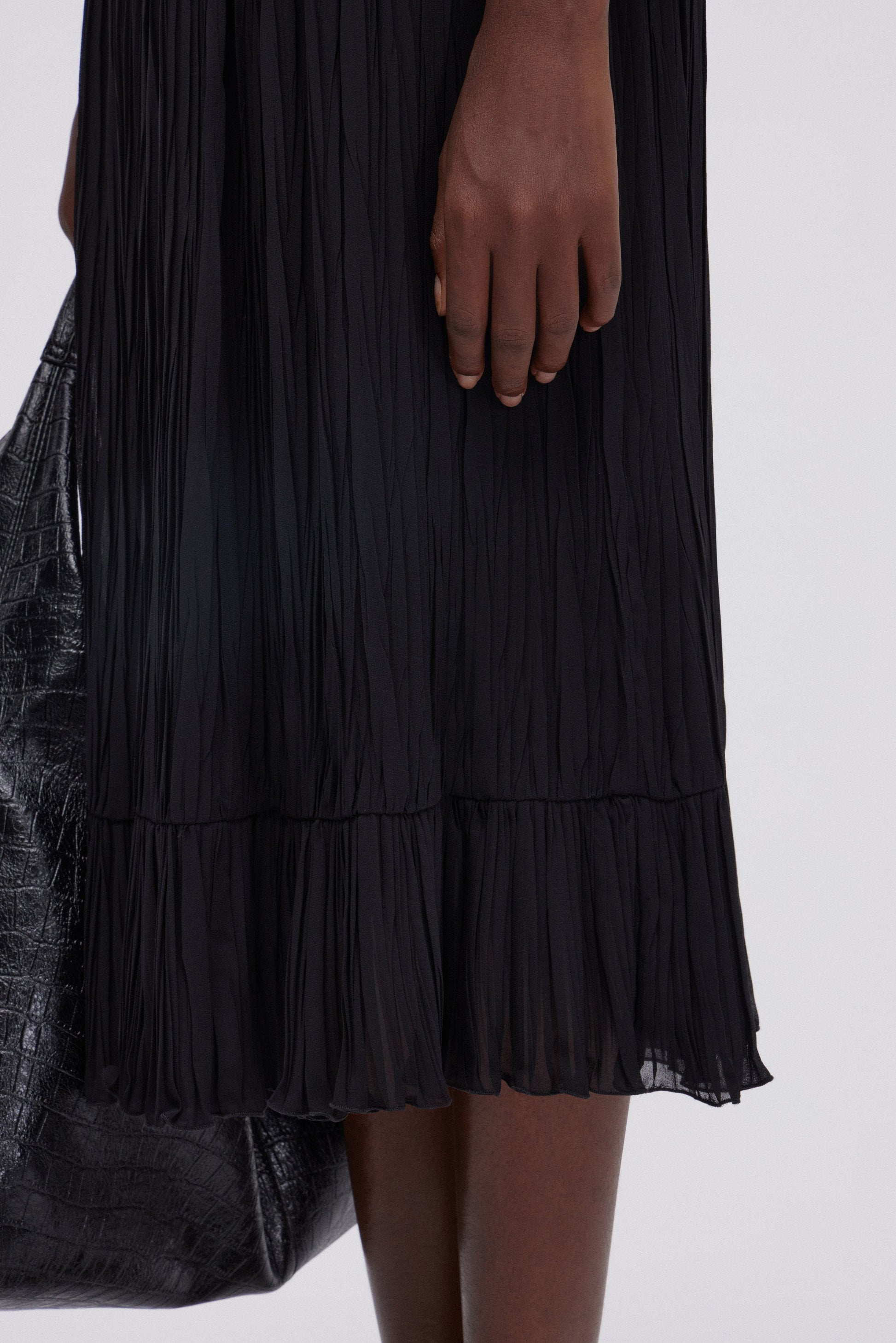 GONNA LONGUETTE DI GEORGETTE PLISSE' CON BALZA