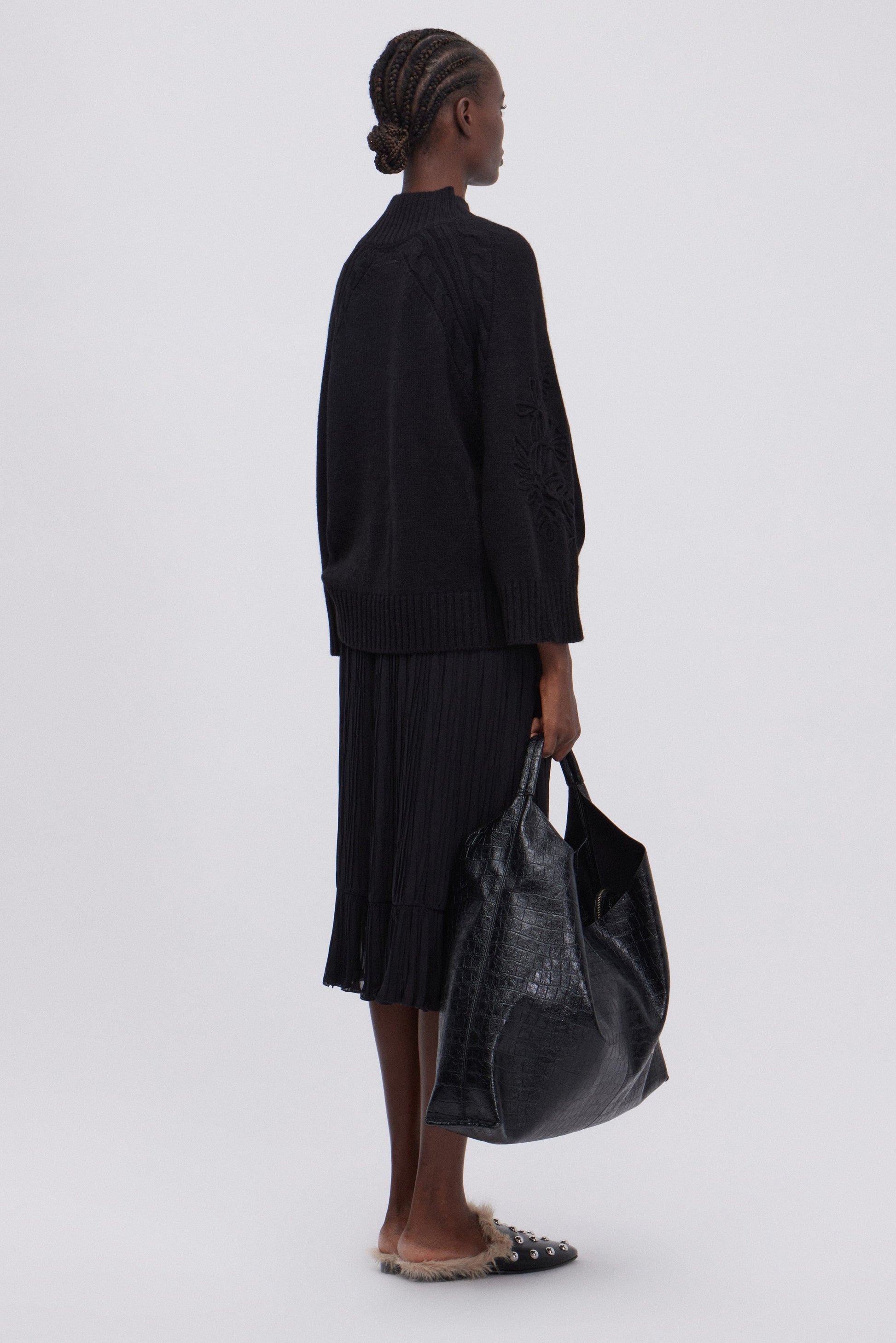 GONNA LONGUETTE DI GEORGETTE PLISSE' CON BALZA