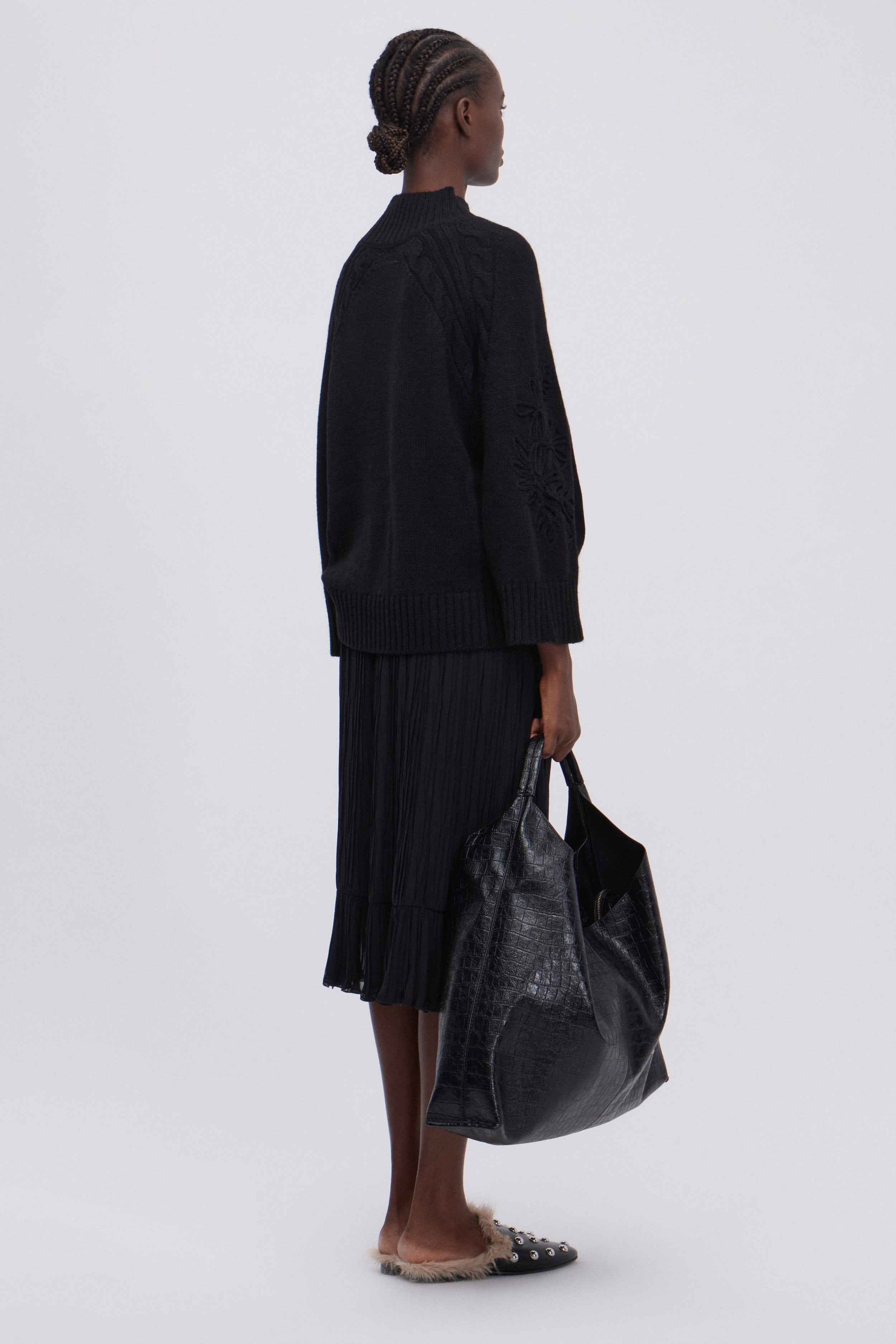 GONNA LONGUETTE DI GEORGETTE PLISSE' CON BALZA