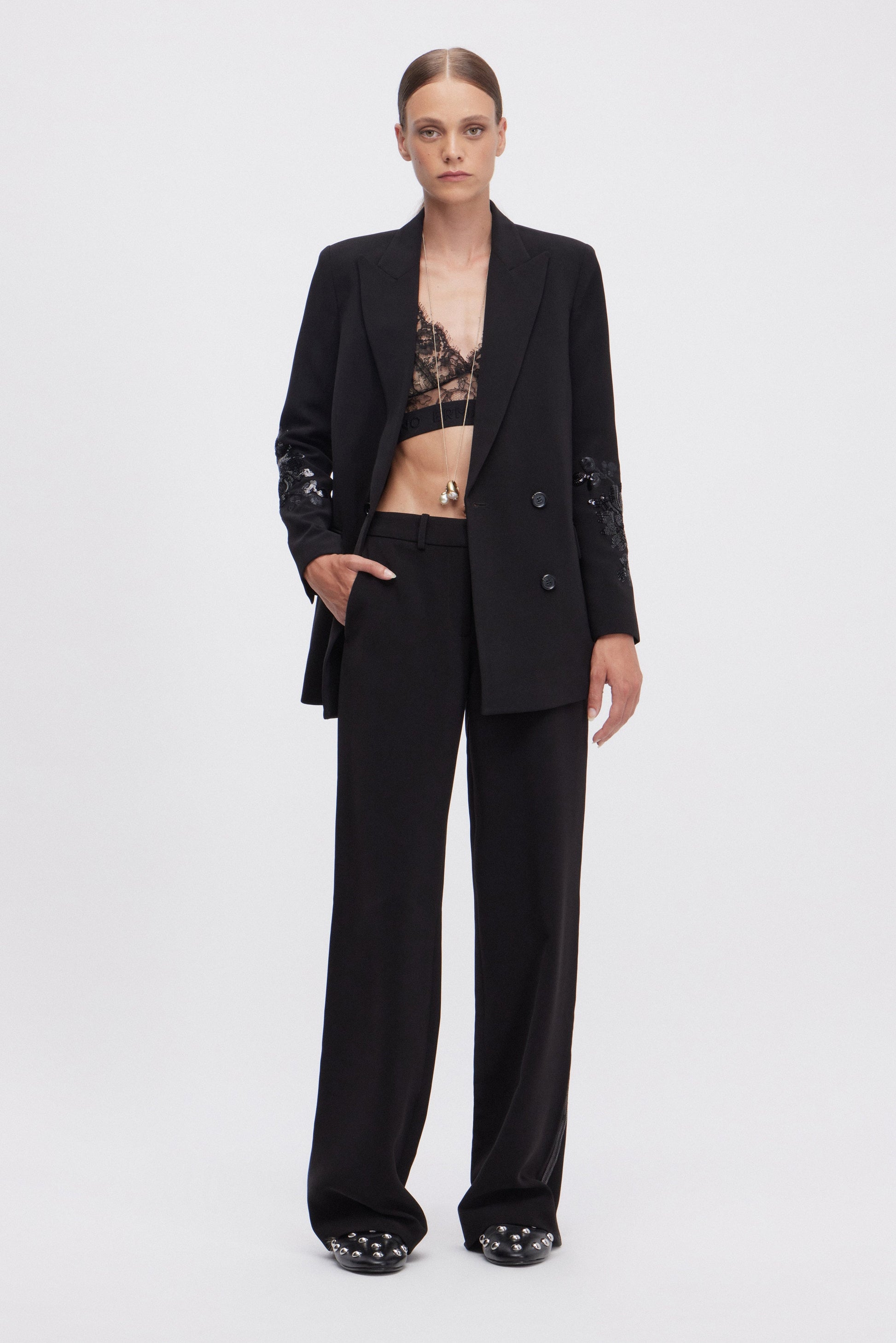 PANTALON EN CADY AVEC BANDE LATĖRALE DE PAILLETTES