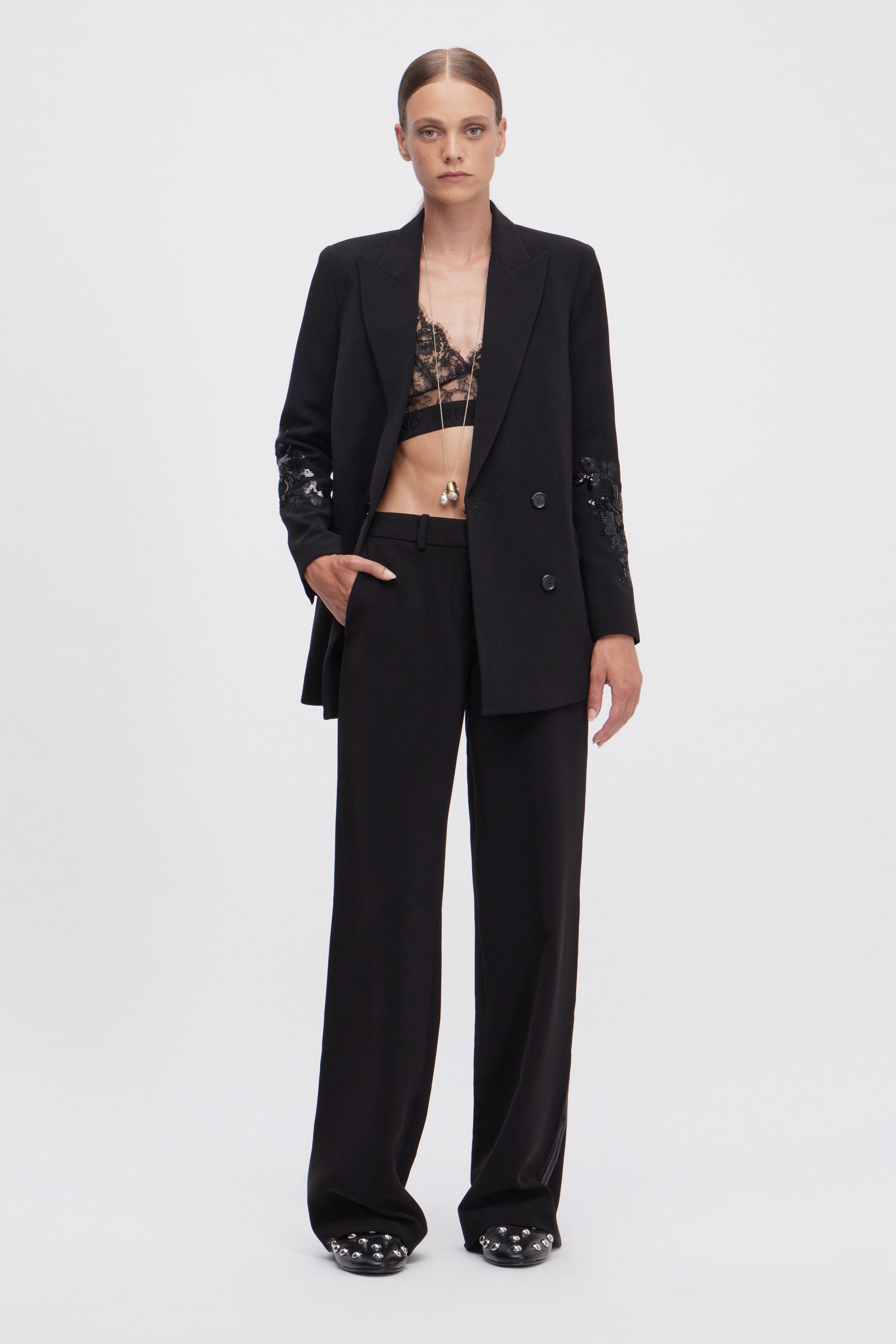 PANTALON EN CADY AVEC BANDE LATĖRALE DE PAILLETTES