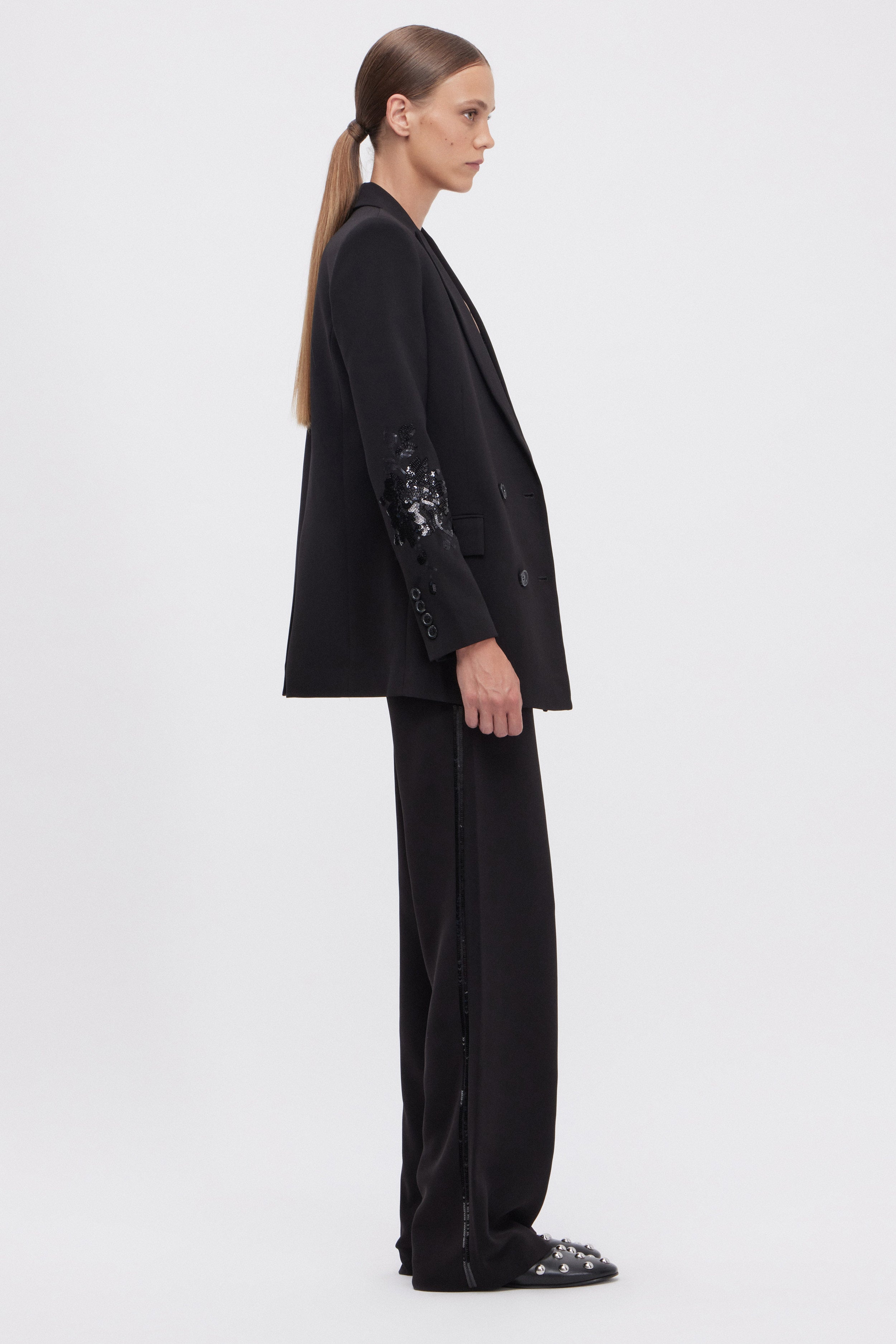 PANTALON EN CADY AVEC BANDE LATĖRALE DE PAILLETTES