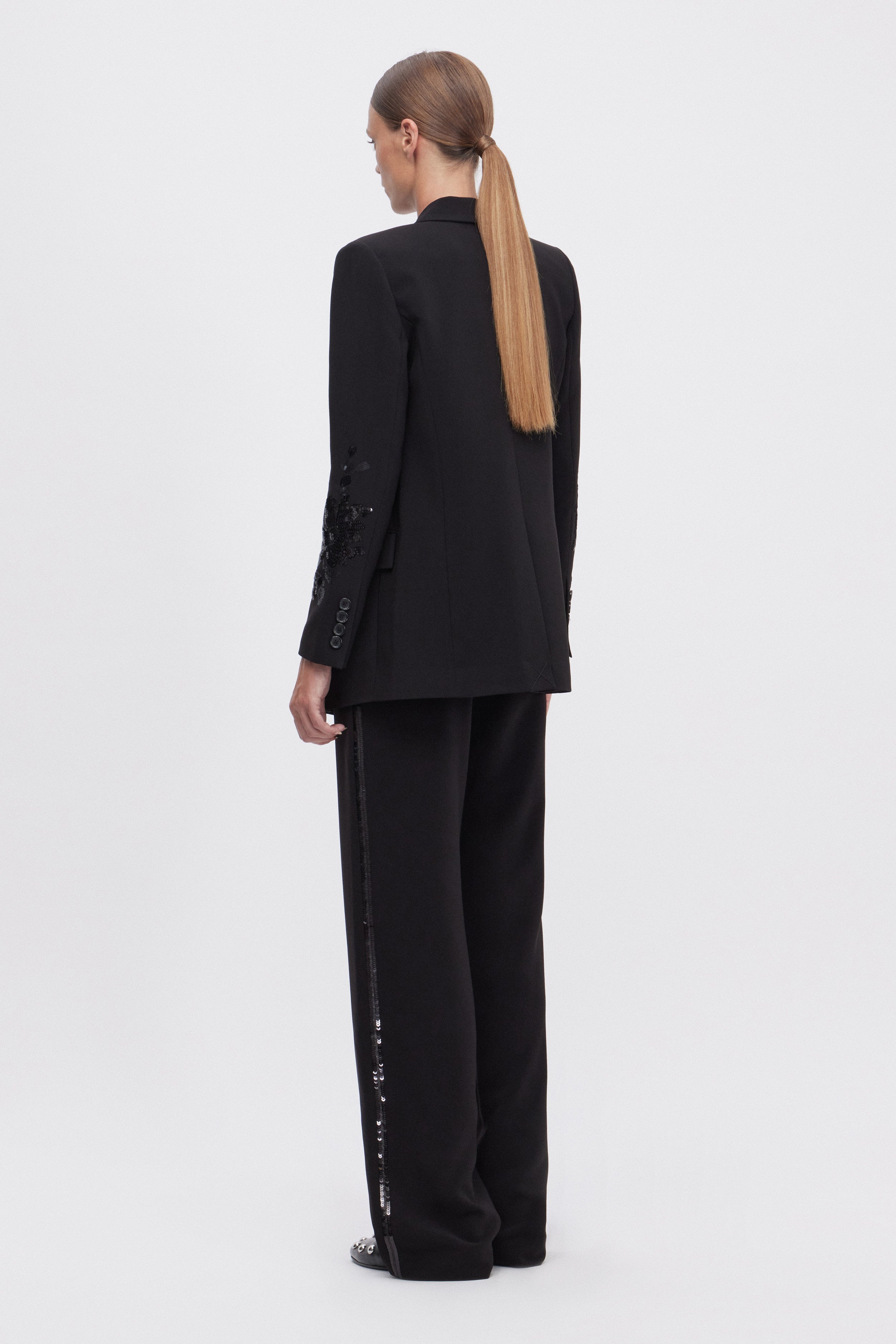 PANTALON EN CADY AVEC BANDE LATĖRALE DE PAILLETTES