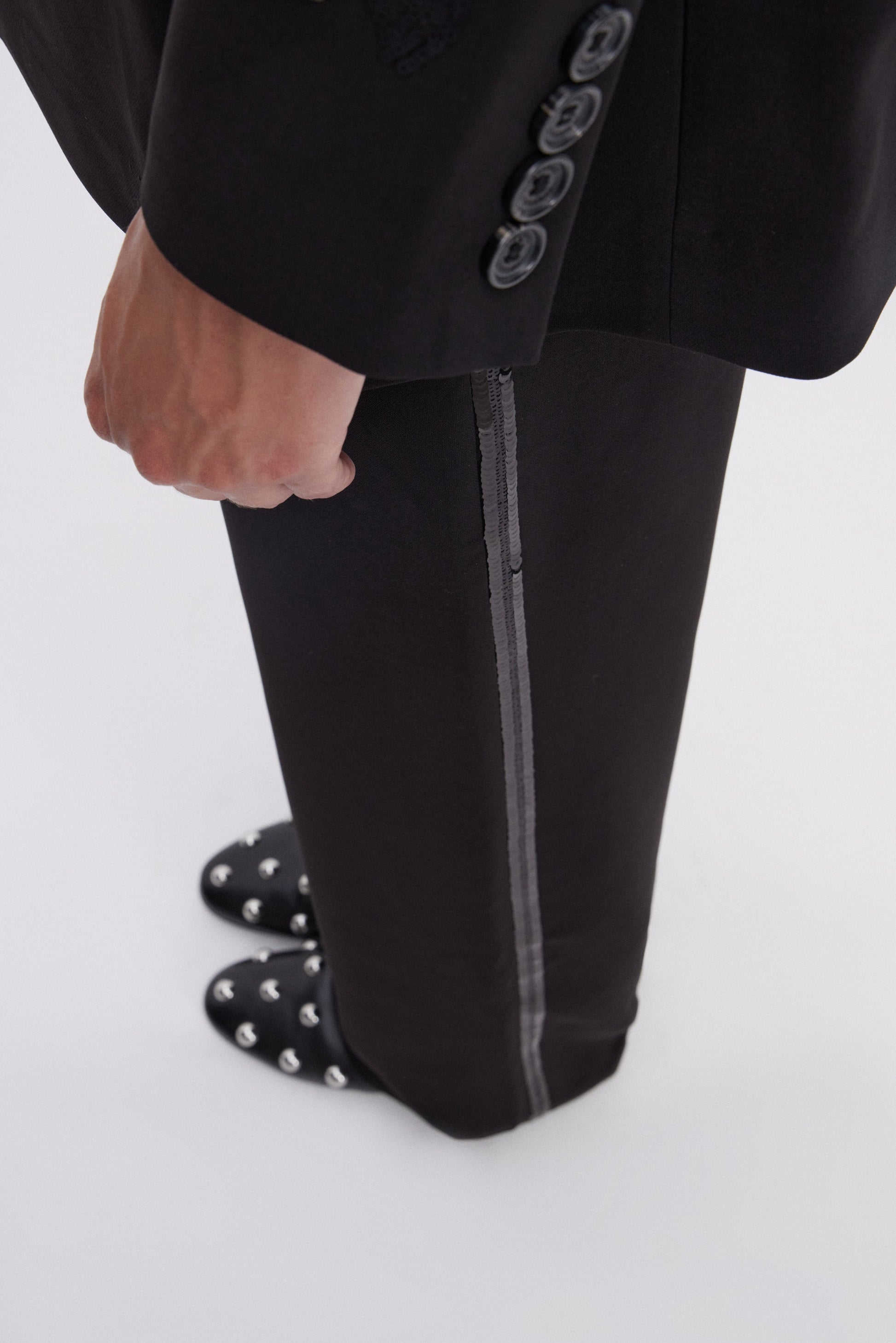 PANTALON EN CADY AVEC BANDE LATĖRALE DE PAILLETTES