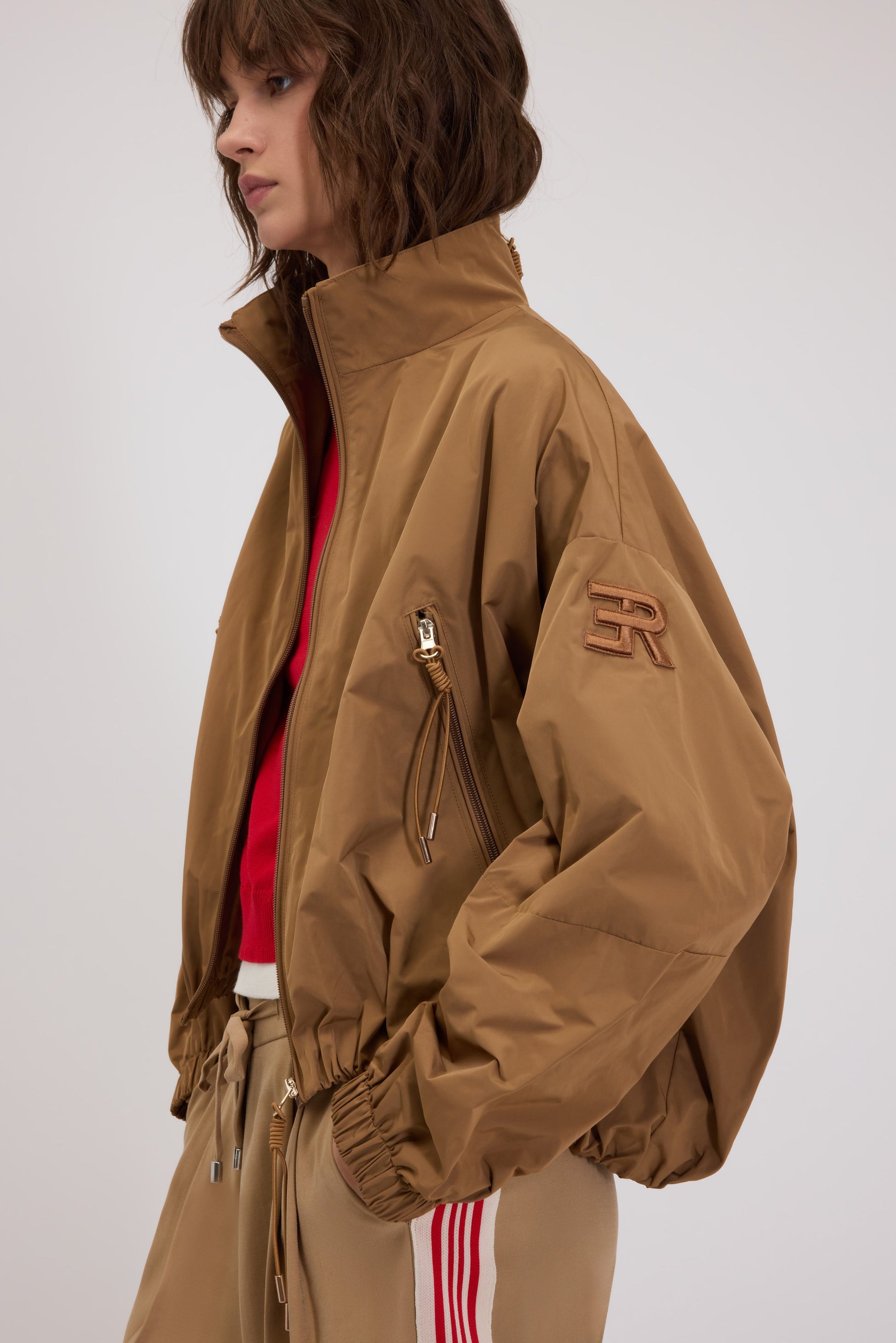 K-WAY EN TAFFETAS AVEC BORD RETROUSSÉ