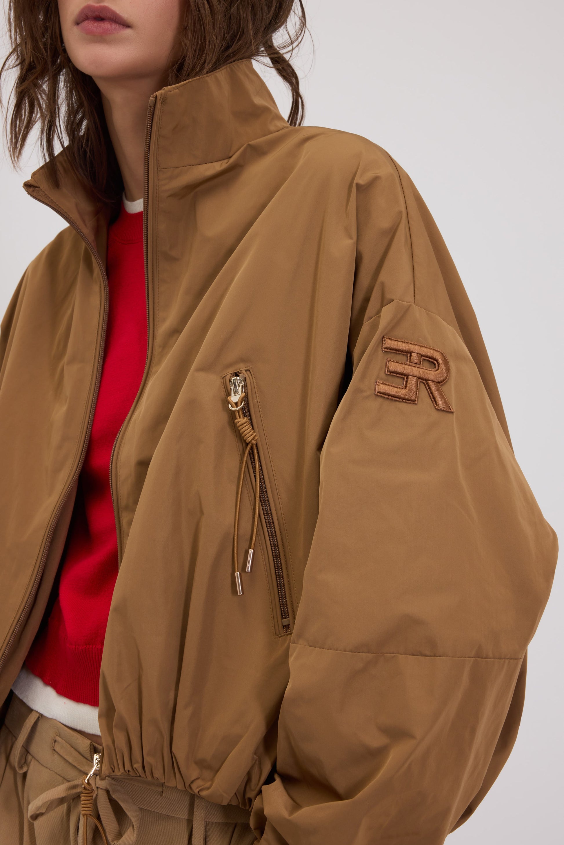 K-WAY EN TAFFETAS AVEC BORD RETROUSSÉ