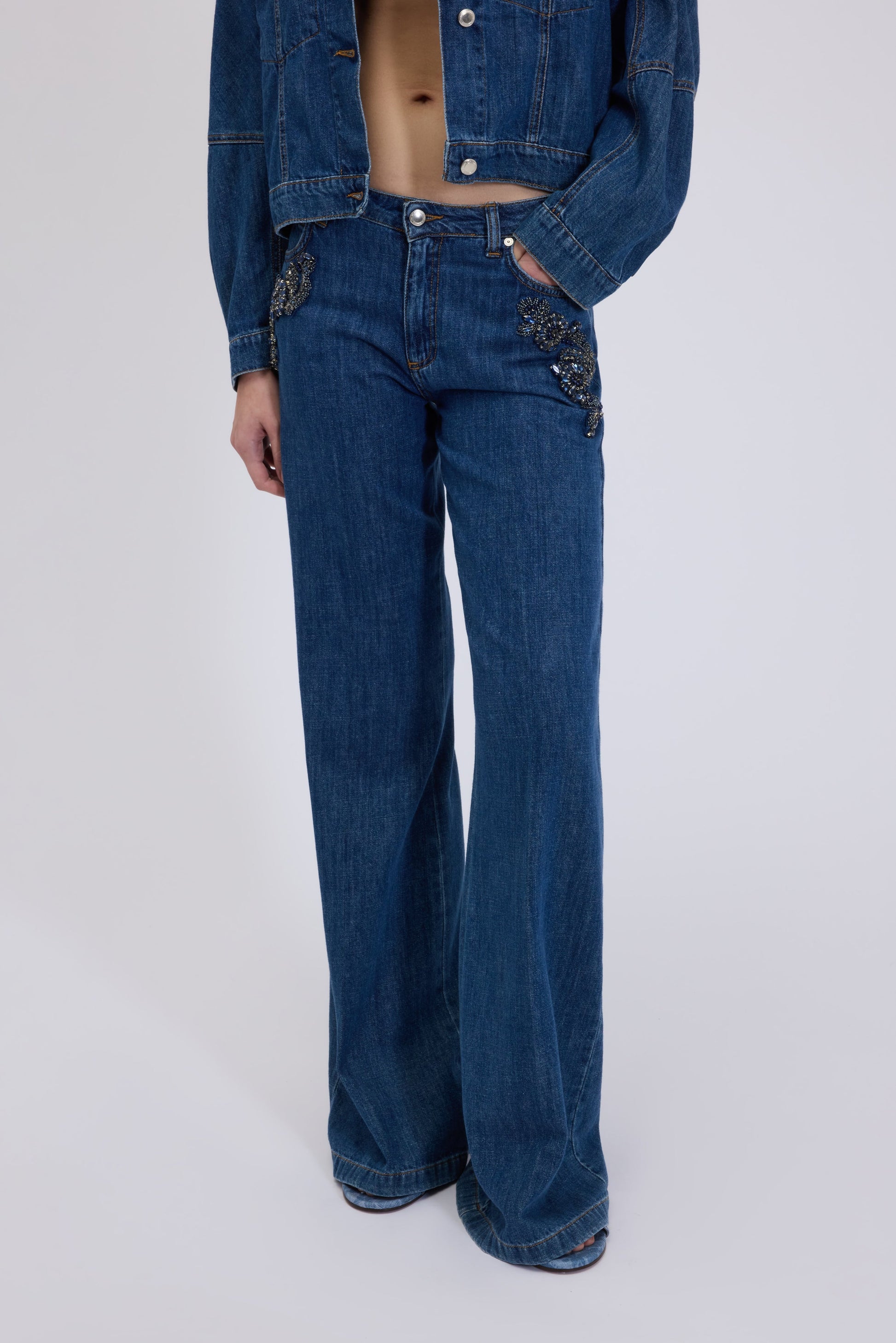 FLARE JEANS WITH JEWELLED FLORAL EMBROIDERY 