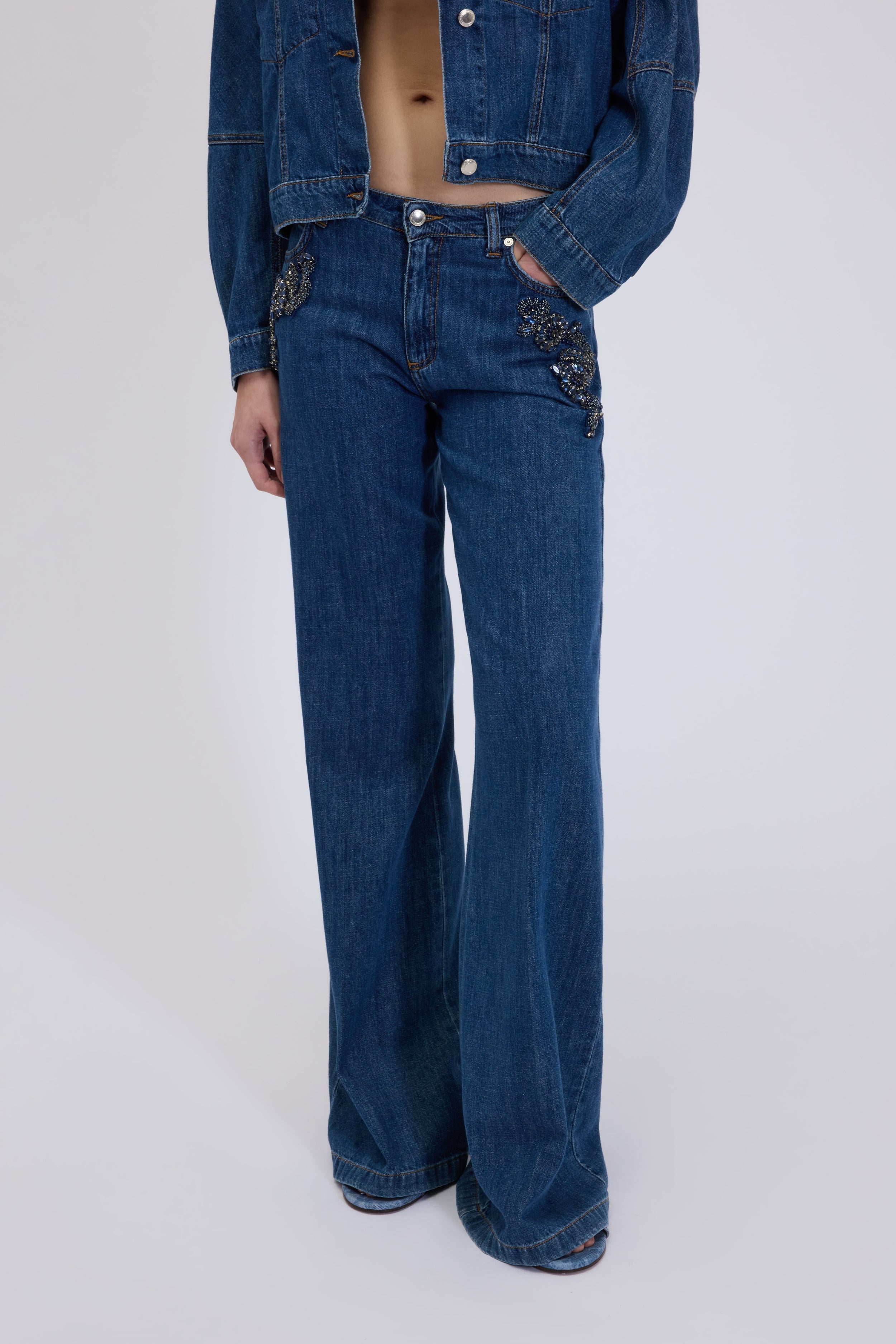 FLARE JEANS WITH JEWELLED FLORAL EMBROIDERY 