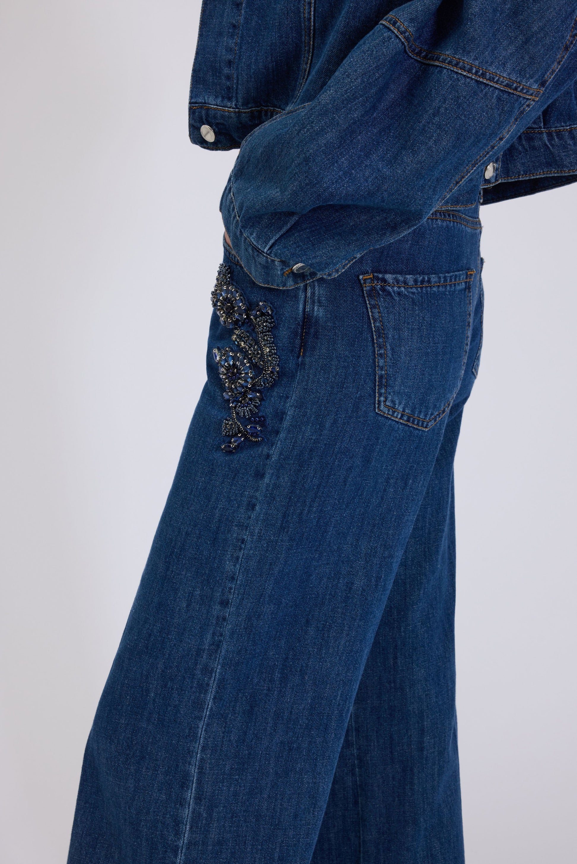 FLARE JEANS WITH JEWELLED FLORAL EMBROIDERY 
