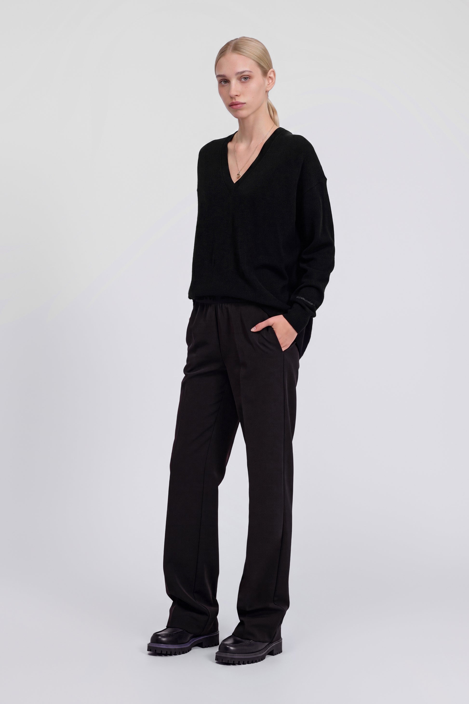 PANTALON STRETCH AVEC TAILLE ÉLASTIQUE LOGOTĖE