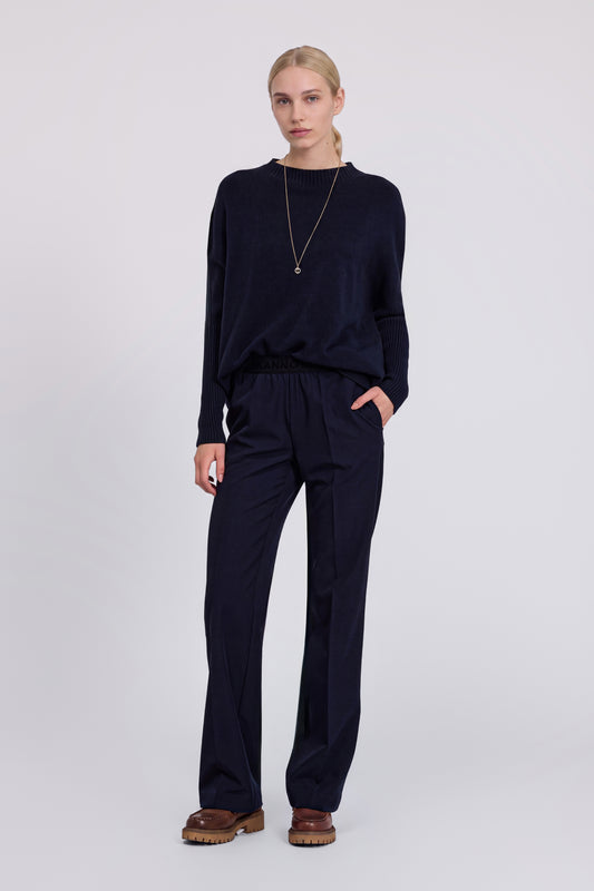 PANTALON STRETCH AVEC TAILLE ÉLASTIQUE LOGOTĖE