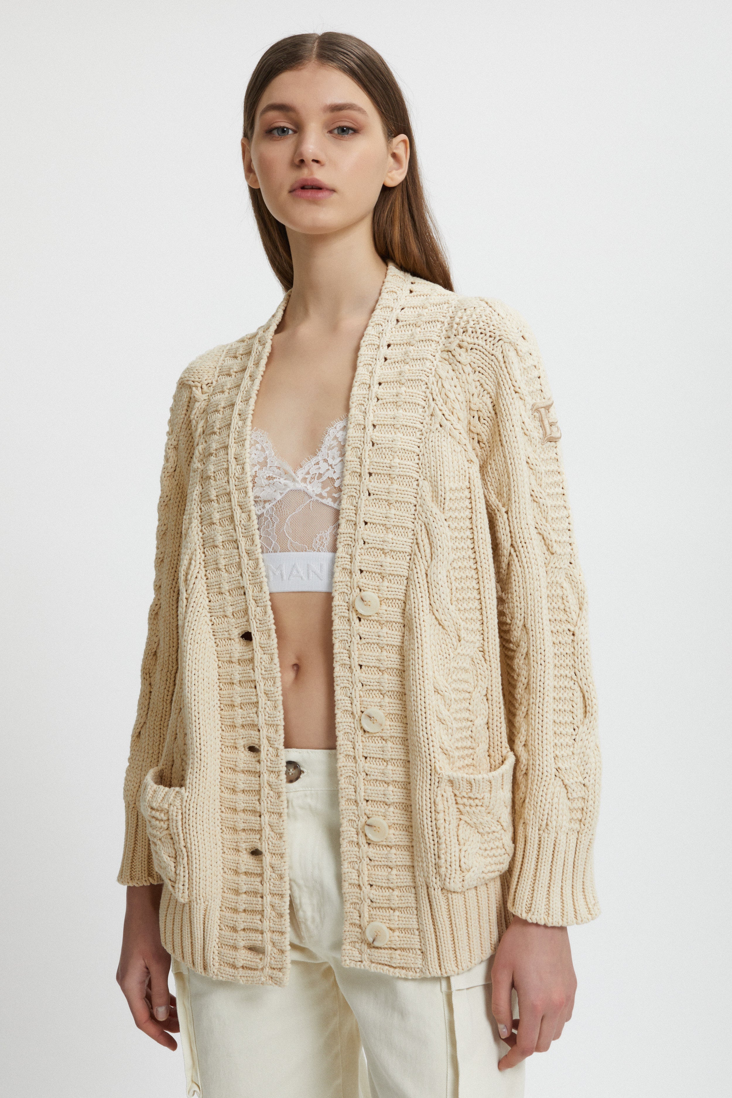 CARDIGAN A TRECCE CON TASCHE